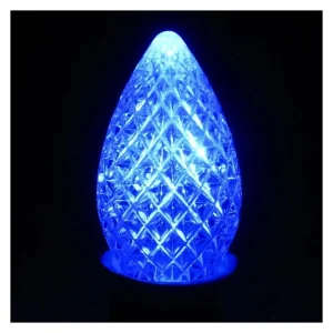 Blue faceted C7 LED bulb with HLS DUO core on dark background