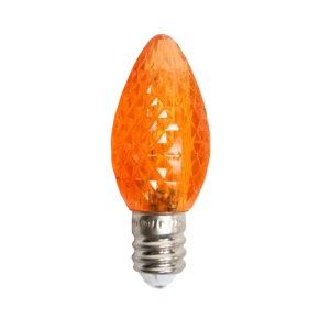 Orange C7 Minleon faceted LED bulb on dark background