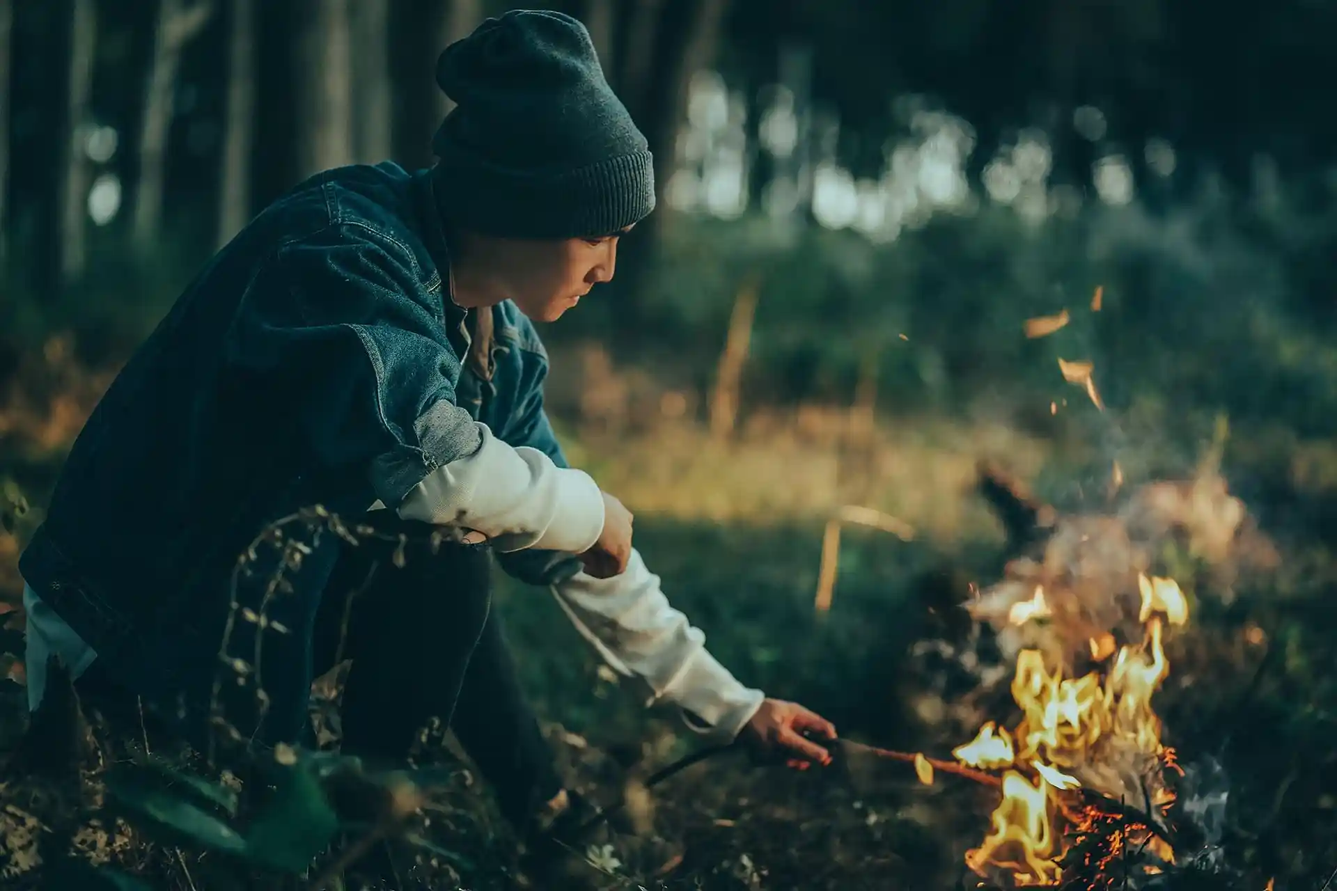 man camp fire